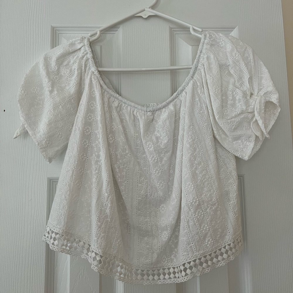 White eyelet crop top.